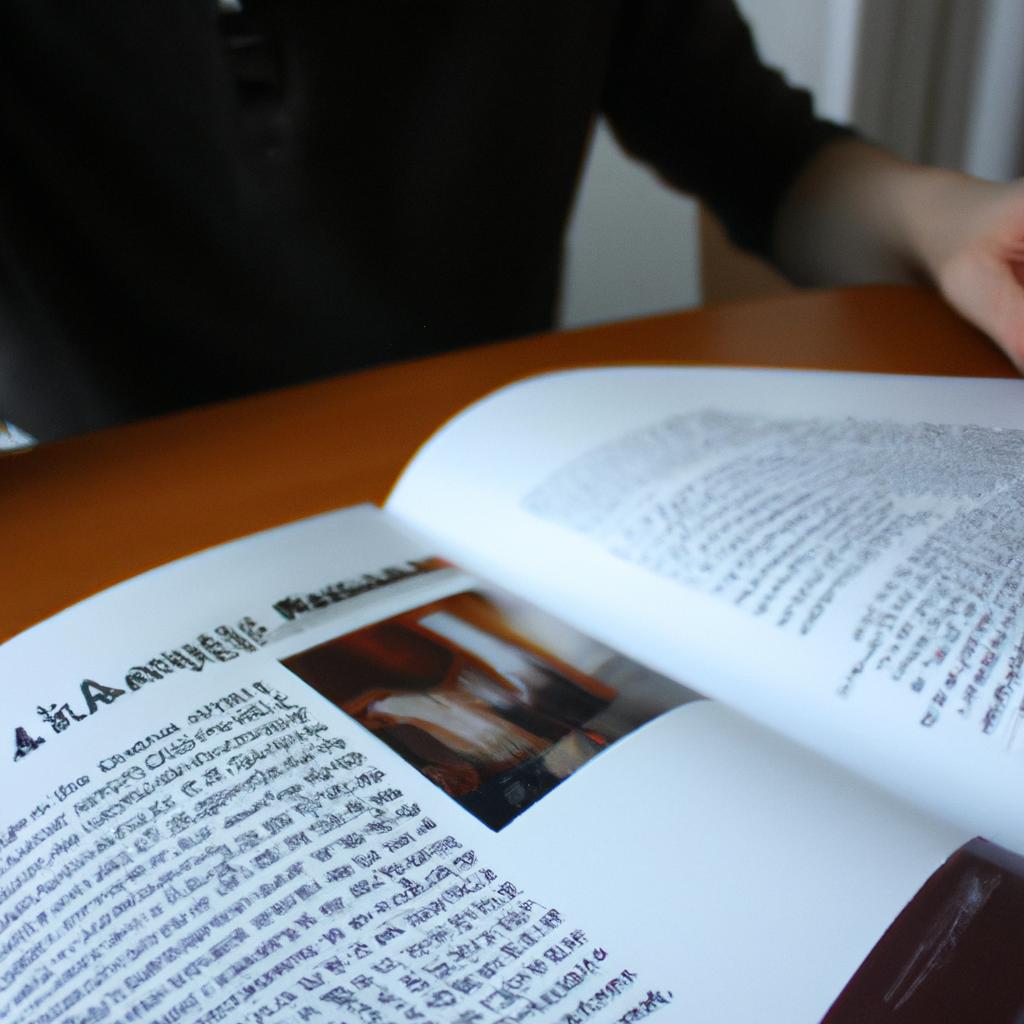 Person reading educational materials, studying